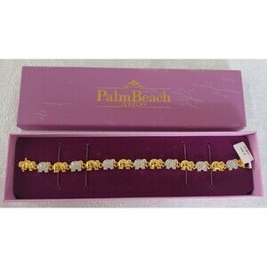 ELEPHANT MOTIF GOLD ELECTROPLATE RHINESTONE 8" BRACELET W/BOX AND TAG